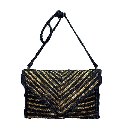 Black and gold striped clutch bag with a black strap on a white background